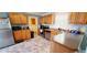 This traditional kitchen showcases oak cabinetry, stainless steel appliances, and durable tiled floors at 1089 Weslin Creek Dr., Myrtle Beach, SC 29588