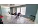 The spacious living room with tiled flooring offers ample natural light, creating an airy ambiance at 1089 Weslin Creek Dr., Myrtle Beach, SC 29588