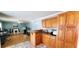 Open floor plan with kitchen and living area, featuring tile and wood flooring at 1089 Weslin Creek Dr., Myrtle Beach, SC 29588