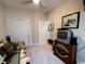 Comfortable bedroom features carpet, ceiling fan and furnishings. Neutral colors make for a relaxing space at 1101 Peace Pipe Pl. # 104, Myrtle Beach, SC 29579