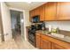 Functional kitchen with essential appliances, granite countertops, and ample cabinet space at 1105 S Ocean Blvd. # 932, Myrtle Beach, SC 29577