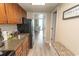 Updated kitchen features stainless appliances, wood cabinets and granite countertops at 1105 S Ocean Blvd. # 932, Myrtle Beach, SC 29577
