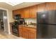Well-equipped kitchen with modern appliances, durable countertops, and efficient storage at 1105 S Ocean Blvd. # 932, Myrtle Beach, SC 29577