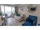 Bright condo with comfortable seating, dining space, and expansive balcony views at 1105 S Ocean Blvd. # 932, Myrtle Beach, SC 29577