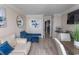 Open-concept living space with a cozy sofa, a dining area, and scenic views at 1105 S Ocean Blvd. # 932, Myrtle Beach, SC 29577