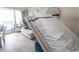 Cozy condo showcasing Murphy bed and sofa, blending comfort and functionality at 1105 S Ocean Blvd. # 932, Myrtle Beach, SC 29577