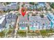 Beautiful aerial view of homes with pools near a beach, highlighting a prime coastal location at 1119 S Ocean Blvd. # 8, Surfside Beach, SC 29575