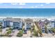 Aerial view of beachfront condos with ample parking and easy access to the sandy beach at 1119 S Ocean Blvd. # 8, Surfside Beach, SC 29575