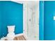 This modern bathroom features a glass-enclosed shower with sleek fixtures, a stylish toilet, and elegant finishes at 1119 S Ocean Blvd. # 8, Surfside Beach, SC 29575
