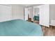 Spacious bedroom showcasing mirrored closet doors and hardwood floors at 1119 S Ocean Blvd. # 8, Surfside Beach, SC 29575