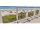 Relaxing deck view with beach scenery and beautiful skies at 1119 S Ocean Blvd. # 8, Surfside Beach, SC 29575