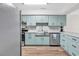 Stylish kitchen boasting stainless steel appliances and plenty of cabinet space at 1119 S Ocean Blvd. # 8, Surfside Beach, SC 29575