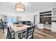 Open-concept living area with views, modern furnishings, and built-in shelving at 1119 S Ocean Blvd. # 8, Surfside Beach, SC 29575