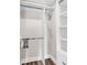 Organized walk-in closet features ample hanging space and shelving, providing storage solutions for clothing and accessories at 1119 S Ocean Blvd. # 8, Surfside Beach, SC 29575