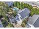 Aerial view of the home featuring a private pool, lush landscaping, and a well-manicured lawn at 1125 Camellia Dr., Surfside Beach, SC 29575
