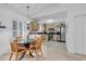 A breakfast area connects the kitchen with a table and 4 chairs with shutters over the large window at 1125 Camellia Dr., Surfside Beach, SC 29575