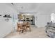 A breakfast area connects the kitchen with a table and 4 chairs with shutters over the large window at 1125 Camellia Dr., Surfside Beach, SC 29575