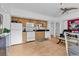 Bright open kitchen featuring white appliances and light wood cabinets at 1125 Camellia Dr., Surfside Beach, SC 29575