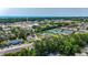 Aerial view of the community surrounded by trees, commercial businesses, the water tower and with the ocean in the distance at 1200 5Th Ave. N # 1207, Surfside Beach, SC 29575