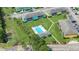 Aerial view of the complex showing community pool, landscaping, and parking at 1200 5Th Ave. N # 1207, Surfside Beach, SC 29575