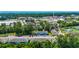 Aerial view of a condo community with assigned parking and beautiful trees in the background and a view of the ocean at 1200 5Th Ave. N # 1207, Surfside Beach, SC 29575
