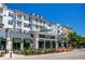 Attractive multi-story building with retail space and residential units, featuring balconies and well-maintained landscaping at 1200 5Th Ave. N # 1207, Surfside Beach, SC 29575