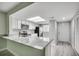 Kitchen with white cabinets, stainless steel appliances, and a breakfast bar with granite countertop at 1200 5Th Ave. N # 1207, Surfside Beach, SC 29575