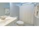 Clean bathroom with white fixtures, shower with curtain, and a neutral color scheme at 1200 Bergen Dr., Loris, SC 29569