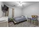 Comfortable ' bedroom with cozy carpet, curtains, and a mounted TV for entertainment at 1200 Bergen Dr., Loris, SC 29569