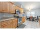 Kitchen showcasing stainless steel appliances, granite countertops, and ample cabinet space at 1200 Bergen Dr., Loris, SC 29569