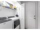 Convenient laundry room with modern washer and dryer, plus ample storage at 1200 Bergen Dr., Loris, SC 29569