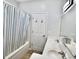 Bathroom featuring a shower with a striped curtain and a double sink vanity with a white countertop at 126 Clovis Circle, Myrtle Beach, SC 29579