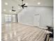 Large, bright living room with vaulted ceilings, a ceiling fan, recessed lights and attractive, easy care floors at 126 Clovis Circle, Myrtle Beach, SC 29579