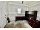 Unfinished office area featuring a large desk space, window, door and unfinished walls at 126 Clovis Circle, Myrtle Beach, SC 29579