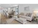 Bright and open living room with modern decor and adjacent kitchen at 128 Hoffman Park Dr. # 03, Myrtle Beach, SC 29588