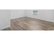 Bright bedroom featuring wood grain floors and a window at 1321 Rabbit Ln., Conway, SC 29526
