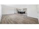 Spacious open-concept, showcasing the seamless flow between the living area and kitchen and new flooring at 1321 Rabbit Ln., Conway, SC 29526