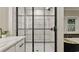 Chic bathroom with a modern glass shower, a vanity, and a standalone tub for a spa-like experience at 1325 Rabbit Ln., Conway, SC 29526