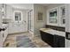 Bright bathroom featuring a vanity, a glass-enclosed shower, and a standalone tub for relaxation at 1325 Rabbit Ln., Conway, SC 29526
