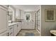 Luxurious bathroom featuring a double sink vanity, a sleek shower, and modern finishes throughout at 1325 Rabbit Ln., Conway, SC 29526