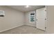 Cozy bedroom with neutral tones, a well-lit window, and a clean, minimalist design for comfort at 1325 Rabbit Ln., Conway, SC 29526