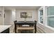 Cozy dining area with a modern table set, a bright window, and contemporary decor, creating an inviting space at 1325 Rabbit Ln., Conway, SC 29526
