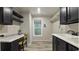 Well-designed laundry area with desk, storage, and natural light creating a functional space at 1325 Rabbit Ln., Conway, SC 29526