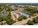 Breathtaking aerial view of the condo community, showcasing nearby pond and the beautiful blue ocean at 1356 Glenns Bay Rd. # A202, Surfside Beach, SC 29575