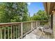 Balcony overlooking a lush green space, with outdoor seating, providing a private retreat at 1356 Glenns Bay Rd. # A202, Surfside Beach, SC 29575