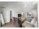 Inviting living area boasts vaulted ceilings and seamless flow into the dining and kitchen spaces at 1356 Glenns Bay Rd. # A202, Surfside Beach, SC 29575