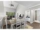 Bright living room with vaulted ceilings, comfortable furniture, adjacent dining room, and stylish decor at 1356 Glenns Bay Rd. # A202, Surfside Beach, SC 29575