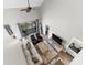 Spacious living room with vaulted ceilings, comfortable seating, a sliding glass door, and stylish decor at 1356 Glenns Bay Rd. # A202, Surfside Beach, SC 29575