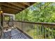 Outdoor patio featuring a swing chair, seats and views of lush greenery at 1356 Glenns Bay Rd. # A202, Surfside Beach, SC 29575