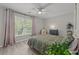 Cozy bedroom featuring a large window offering natural light and beautiful outdoor views at 1409 Highway 15 # 4, Myrtle Beach, SC 29577